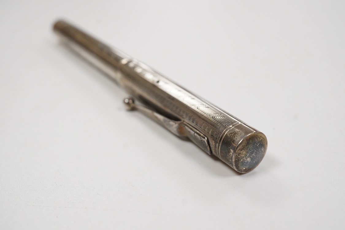 A Mabie Todd & Co. Swan Sterling silver lever filler, Made in USA with 14ct. flexible nib